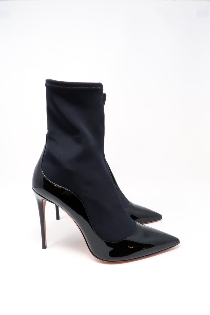 black patent leather heels with black nylon ankle socket attachment (side view)