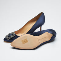 navy blue satin heels with dark grey crystal buckle ornament (bottom view)
