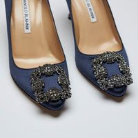 navy blue satin heels with dark grey crystal buckle ornament (close view)