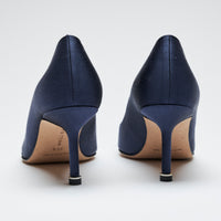 navy blue satin heels with dark grey crystal buckle ornament (back view)