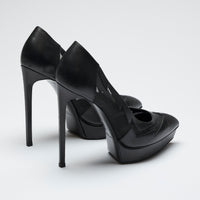 black leather and mesh platform heels (back view)