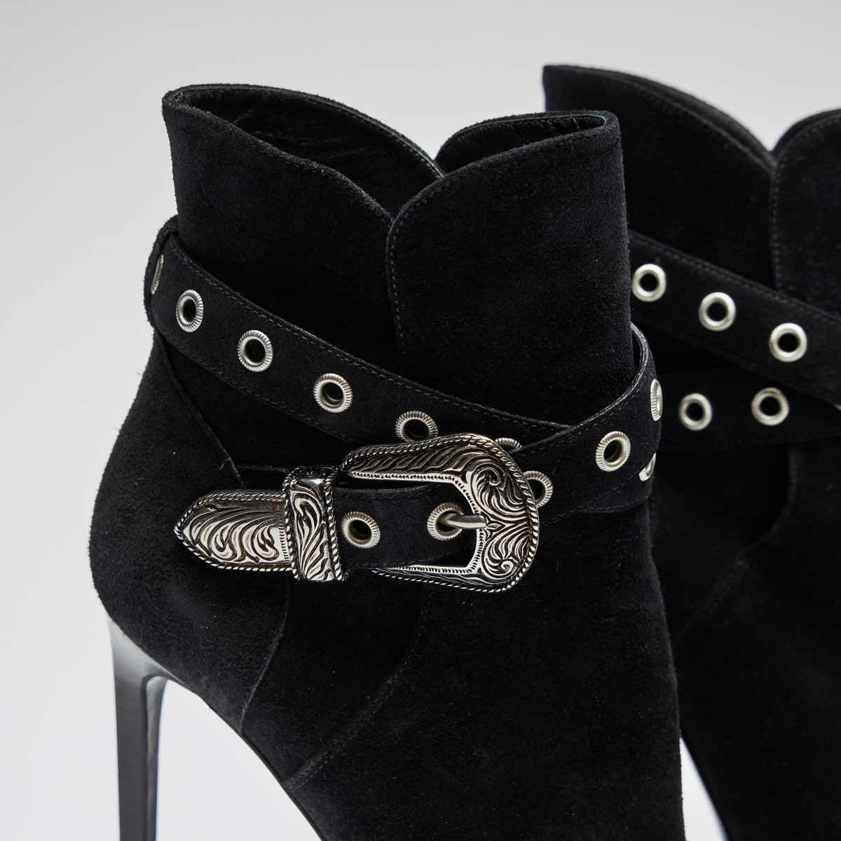 black suede platform high heel ankle boots with ankle strap details (close up view)